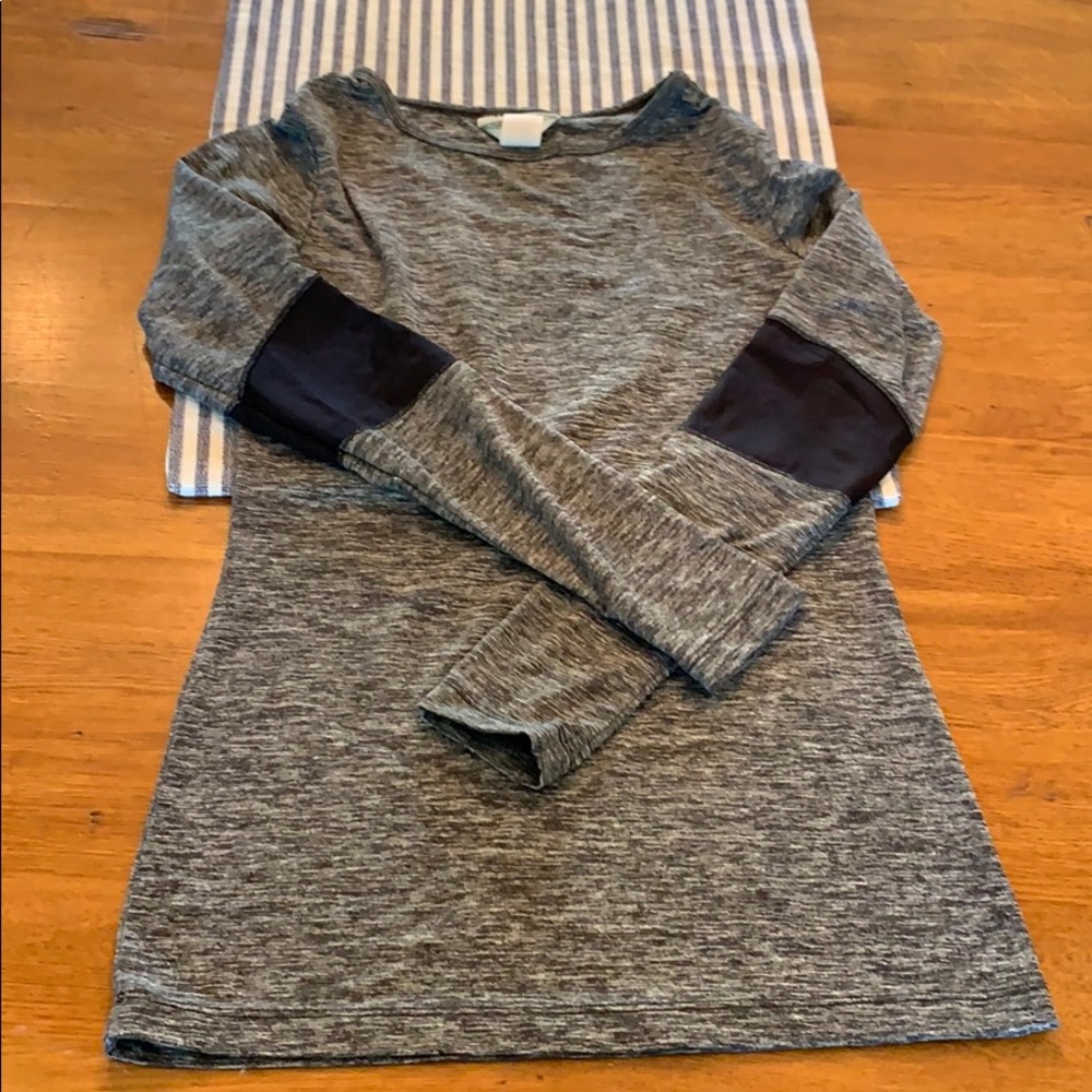 Hard tail wicking material long sleeve top.
